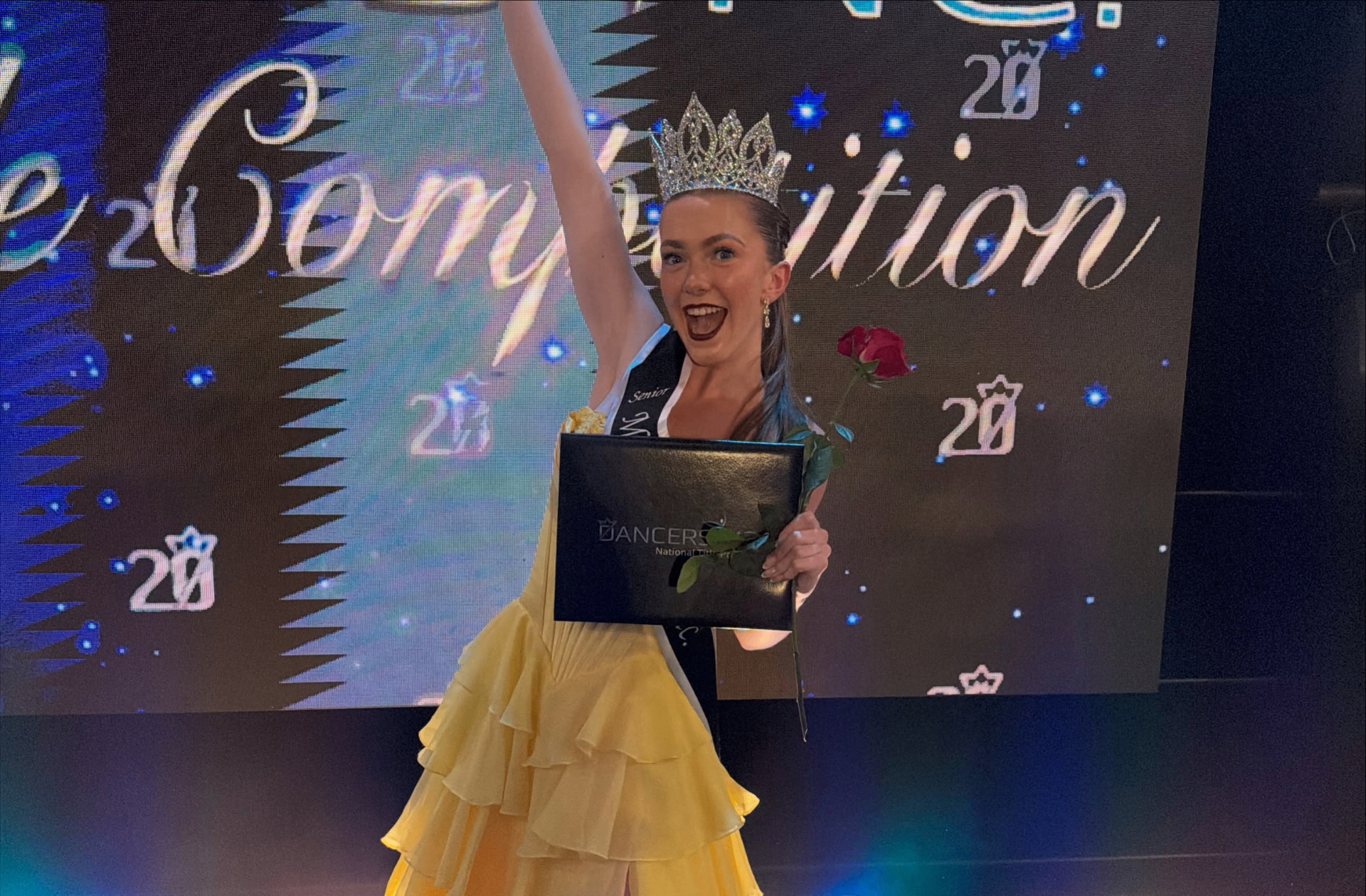 Senior National Title winner — crowned and glowing.